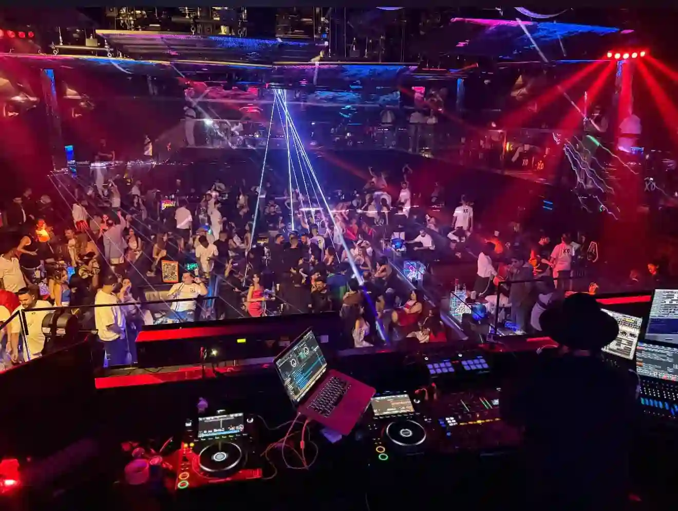 Aerial dancer performing at XO Club Dubai, a highlight of Dubai nightlife